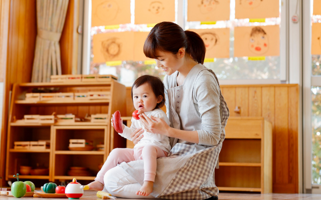 Childcare worker and child 